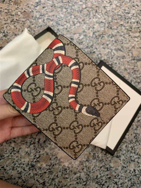 how to know if your gucci wallet is real|authentic Gucci snake wallet.